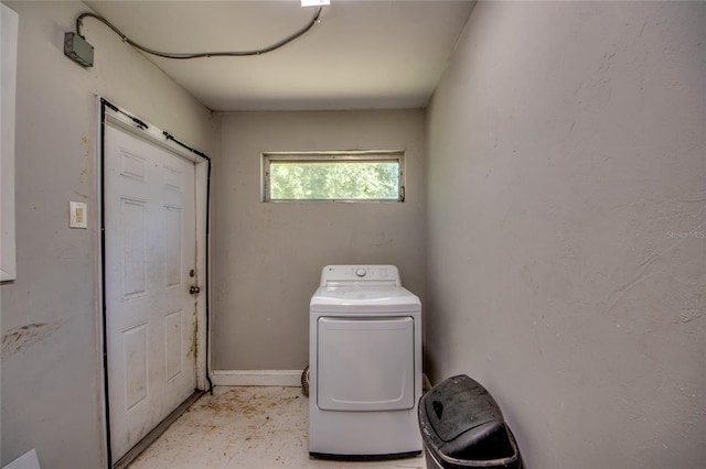 washroom with washer / dryer