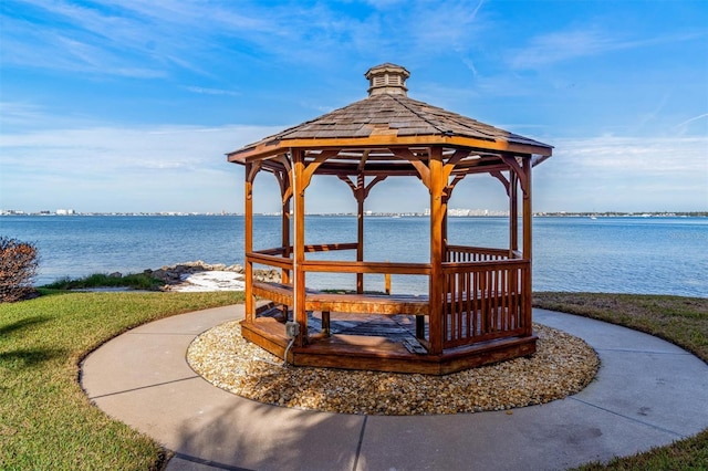 view of community featuring a gazebo and a water view