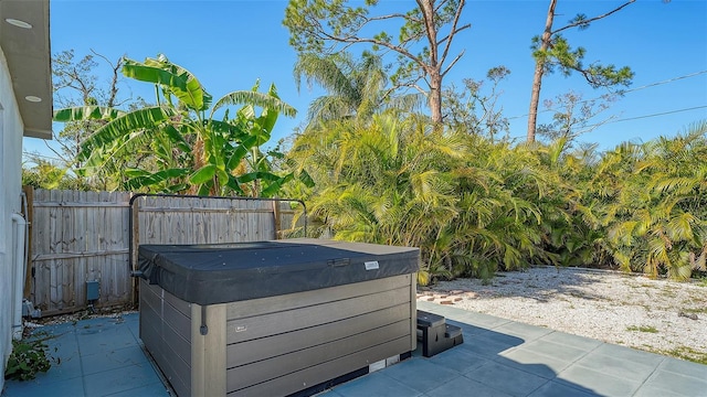 view of patio with a hot tub