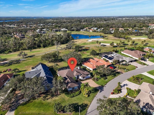 bird's eye view with a residential view, a water view, and golf course view