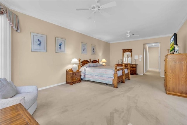 bedroom featuring ornamental molding, baseboards, and light carpet