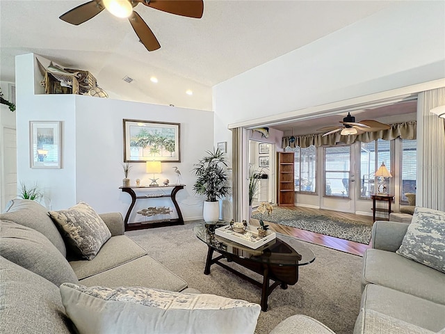 living room featuring light hardwood / wood-style floors and lofted ceiling