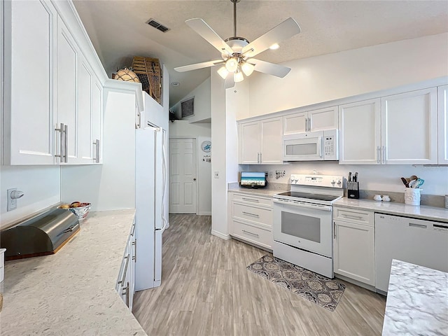 kitchen featuring white appliances, ceiling fan, high vaulted ceiling, light hardwood / wood-style flooring, and white cabinets