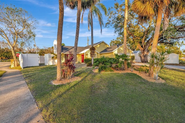 ranch-style home with a front yard