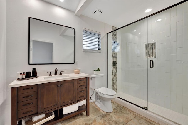 bathroom featuring an enclosed shower, vanity, and toilet