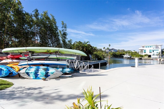 dock area with a water view