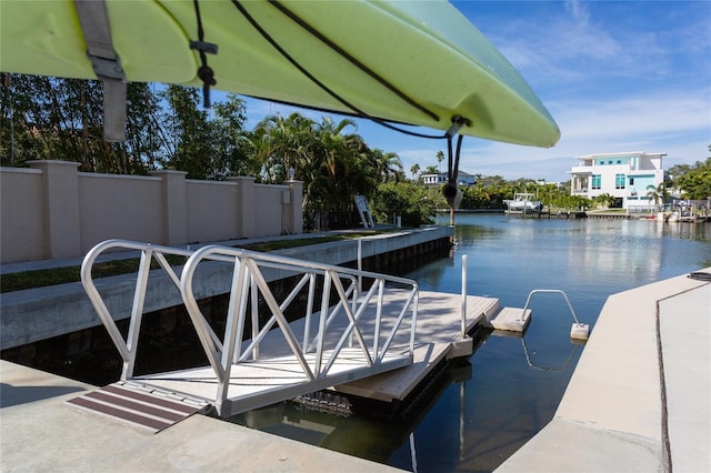 view of dock with a water view