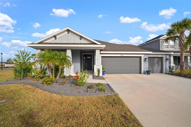 view of front facade featuring a garage and a front yard