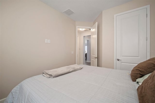 bedroom with a textured ceiling