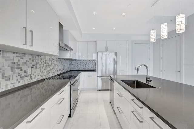 kitchen featuring white cabinetry, stainless steel appliances, and sink