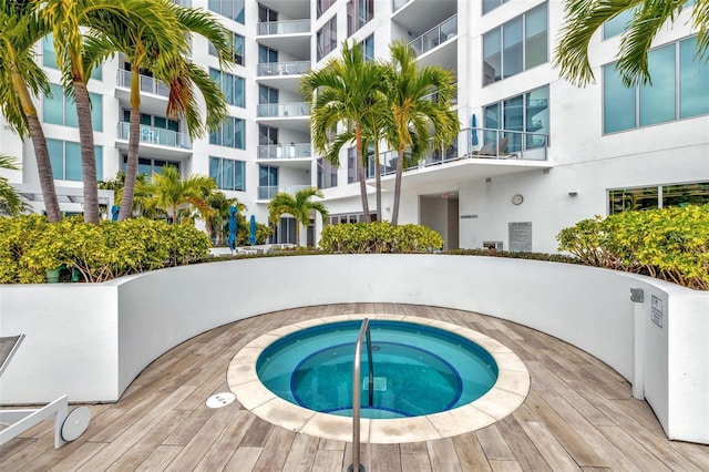 view of pool featuring a community hot tub