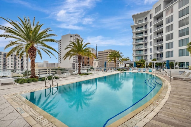 view of swimming pool featuring a patio