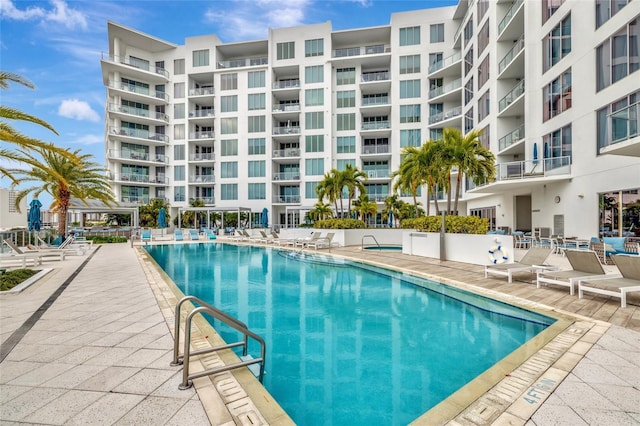 view of swimming pool featuring a patio