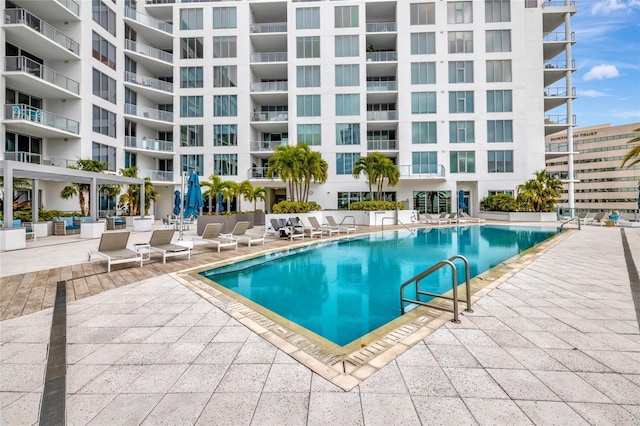 view of pool featuring a patio area