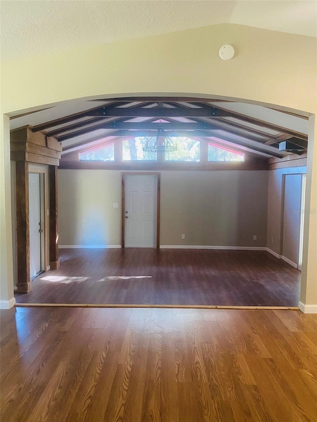 interior space with a healthy amount of sunlight and lofted ceiling