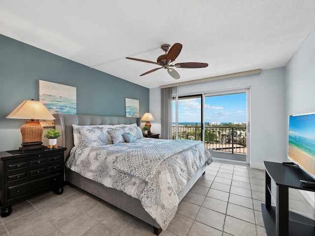 bedroom featuring light tile patterned floors, a textured ceiling, access to outside, and ceiling fan