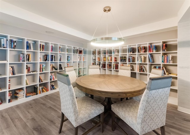 dining room with wood-type flooring