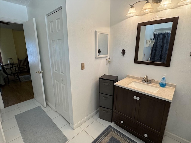 bathroom featuring vanity and tile patterned flooring