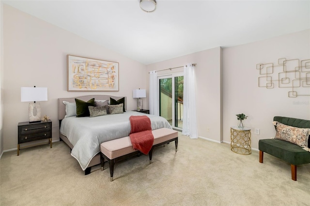 bedroom with light colored carpet, access to outside, and vaulted ceiling