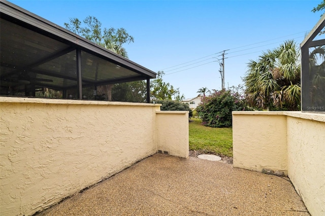 view of side of property with a sunroom