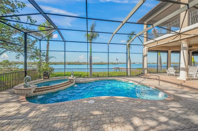 view of swimming pool featuring a lanai, a water view, an in ground hot tub, and a patio