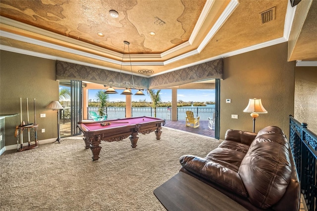 playroom with a raised ceiling, crown molding, carpet floors, and pool table