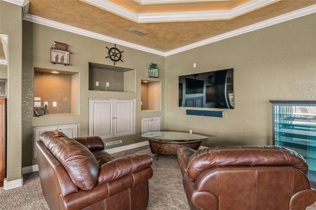 carpeted living room featuring a tray ceiling and crown molding