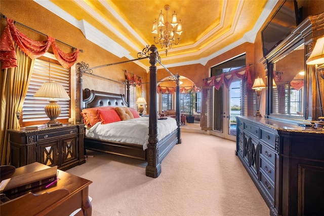 bedroom featuring a tray ceiling, ornamental molding, light colored carpet, and access to outside