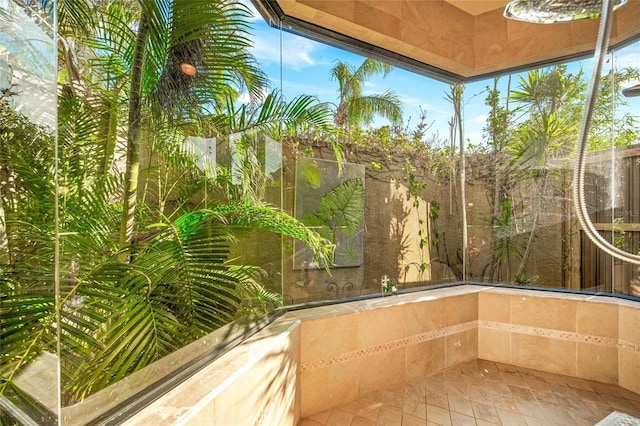 unfurnished sunroom featuring plenty of natural light