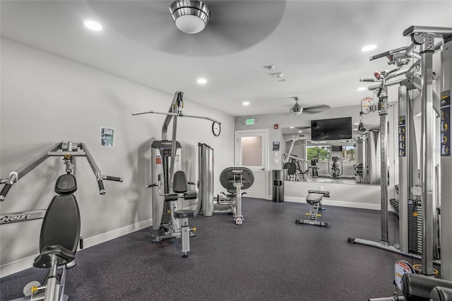 exercise room with ceiling fan