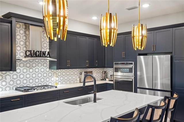 kitchen featuring stainless steel appliances, light stone countertops, sink, and wall chimney exhaust hood