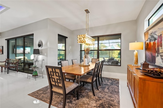 dining space with a notable chandelier