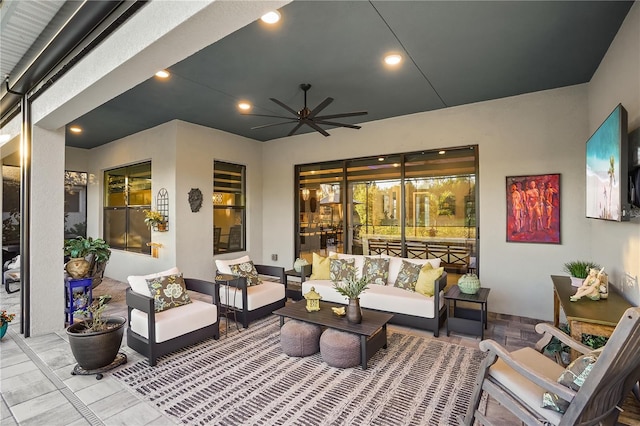 view of patio / terrace with an outdoor living space and ceiling fan