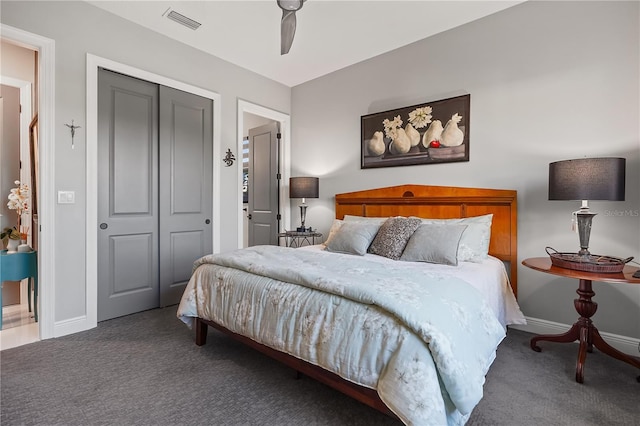 carpeted bedroom featuring a closet and ceiling fan