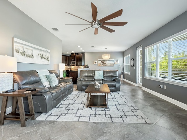 living room with ceiling fan