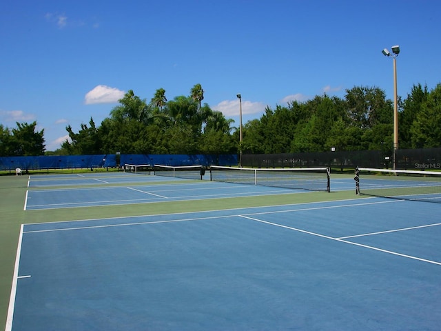 view of tennis court with basketball court