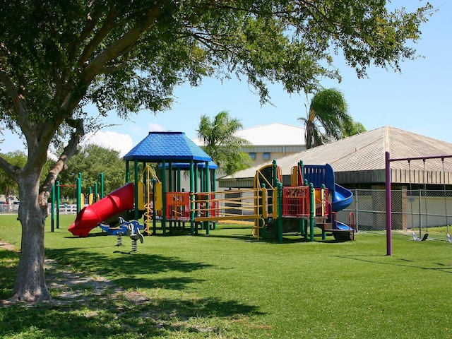 view of jungle gym with a yard