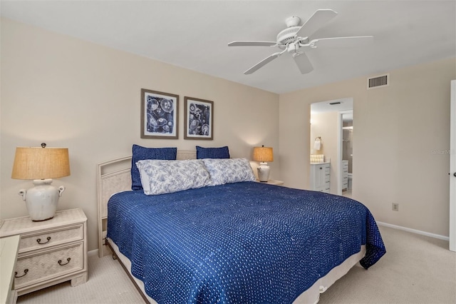 bedroom with ceiling fan and light colored carpet