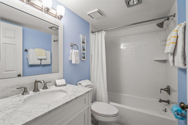 full bathroom with vanity, toilet, and shower / bathtub combination with curtain