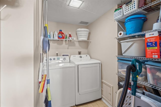 washroom featuring separate washer and dryer