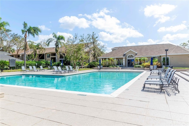 view of swimming pool featuring a patio