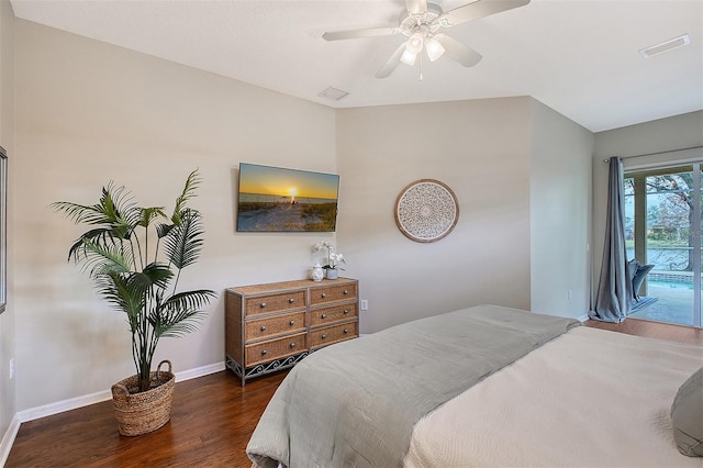 bedroom with visible vents, baseboards, dark wood finished floors, ceiling fan, and access to outside