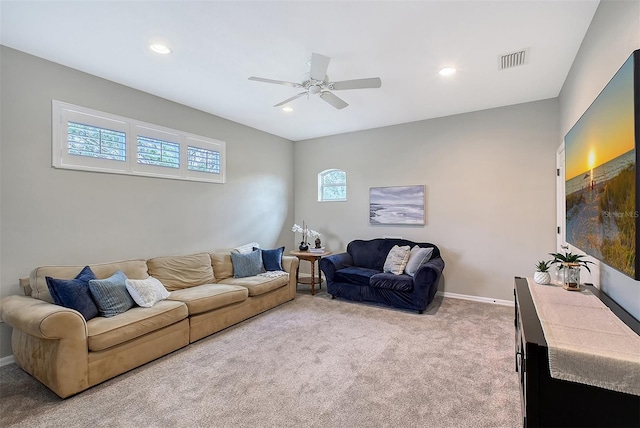 living area with light carpet, baseboards, visible vents, ceiling fan, and recessed lighting