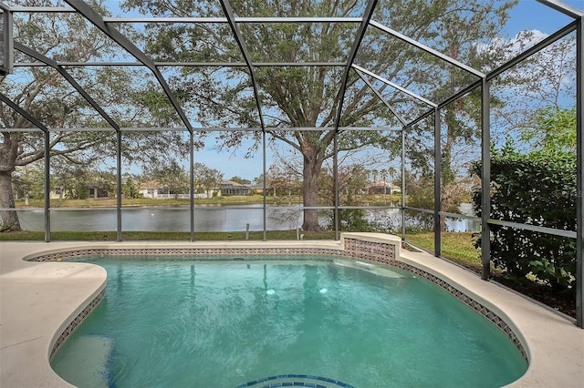 pool featuring a water view and glass enclosure