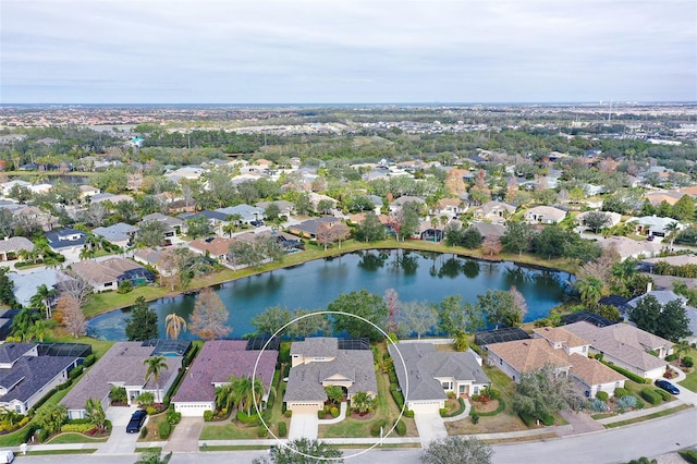 bird's eye view with a residential view and a water view