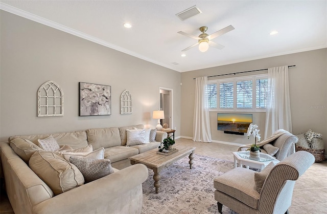 living room featuring visible vents, crown molding, and light tile patterned flooring