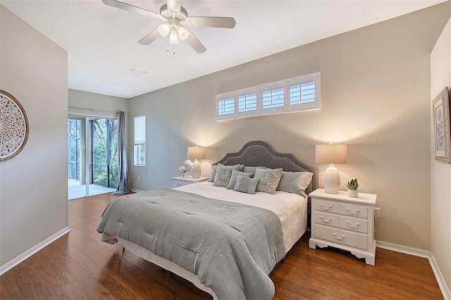 bedroom with dark wood-style floors, access to outside, ceiling fan, and baseboards