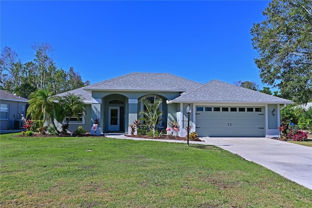 ranch-style house with a front lawn and a garage