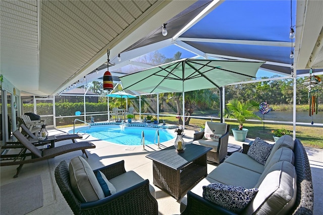 view of swimming pool with a lanai, a patio area, and an outdoor hangout area