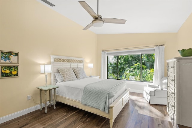 bedroom featuring ceiling fan, lofted ceiling, and dark wood-type flooring